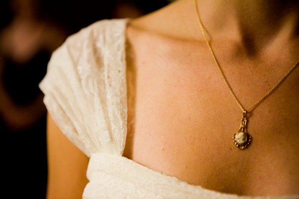 a close up of a cameo necklace