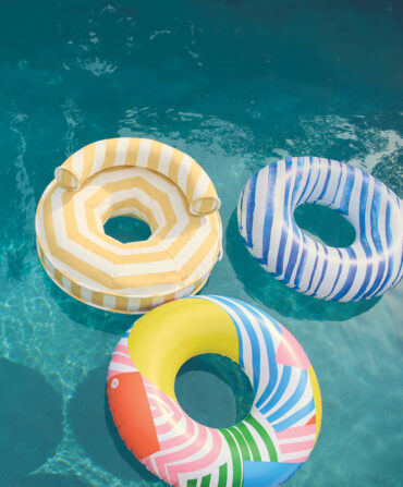 A collection of three pool floats