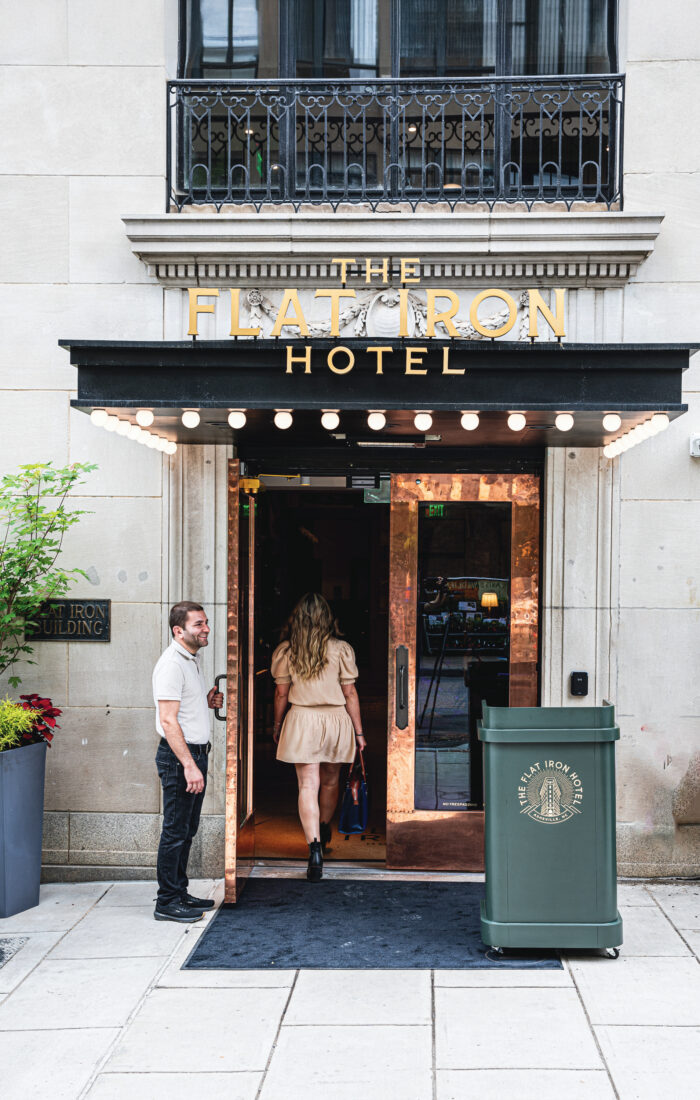 A woman walks into a hotel door