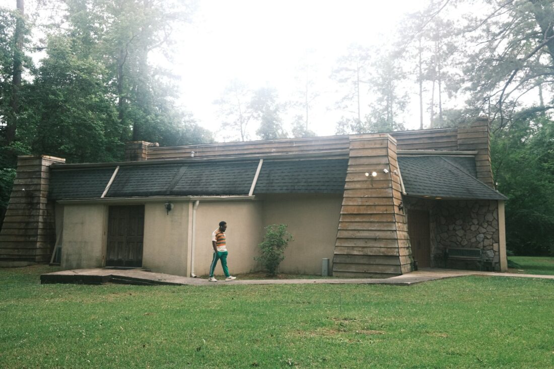 A man walks outside a building