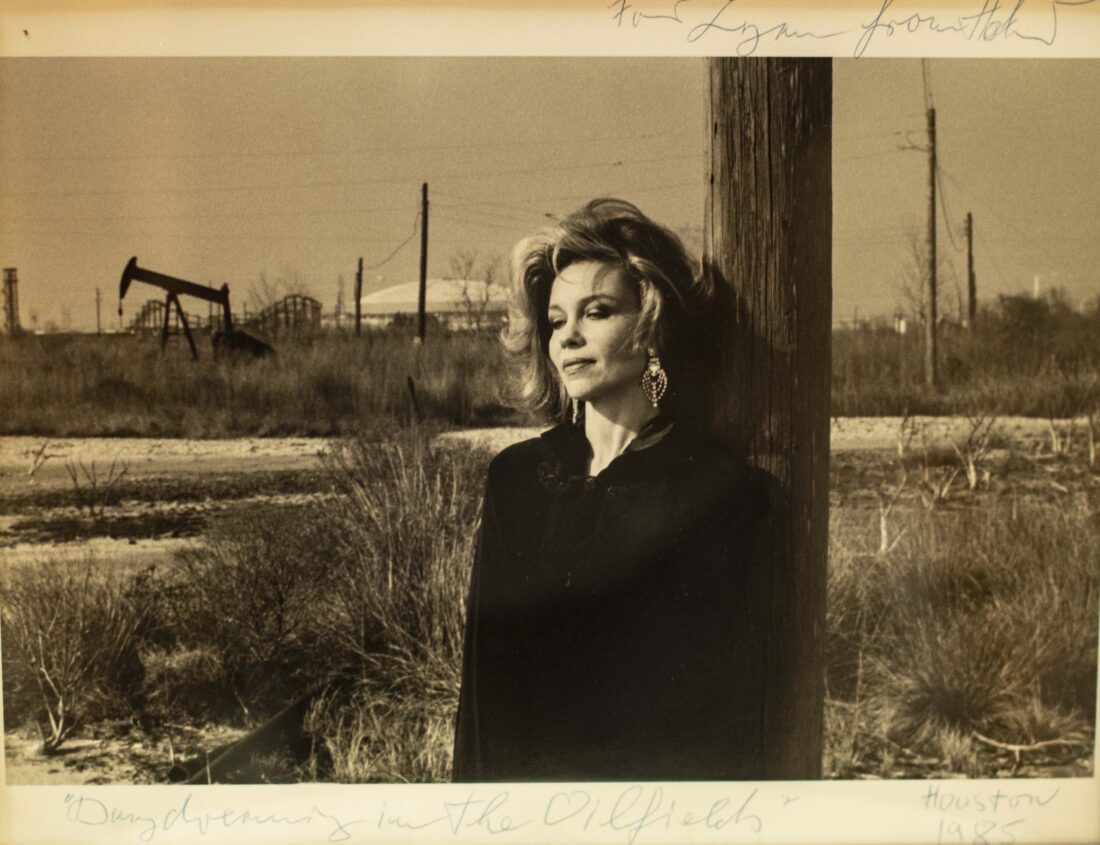 A portrait of a woman standing outside