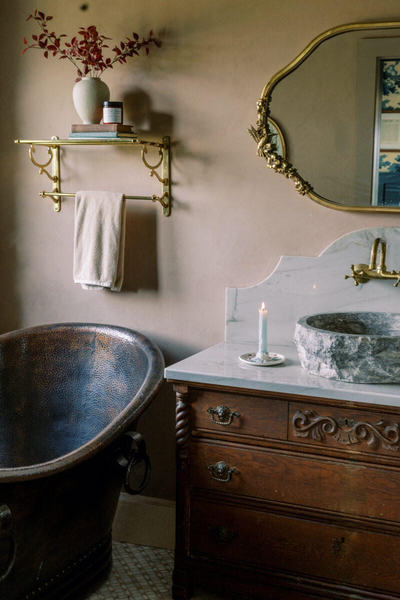 A copper tub in a bathroom